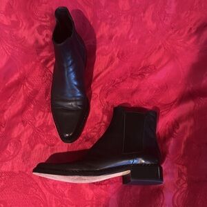 Vince black leather boots. In excellent condition.